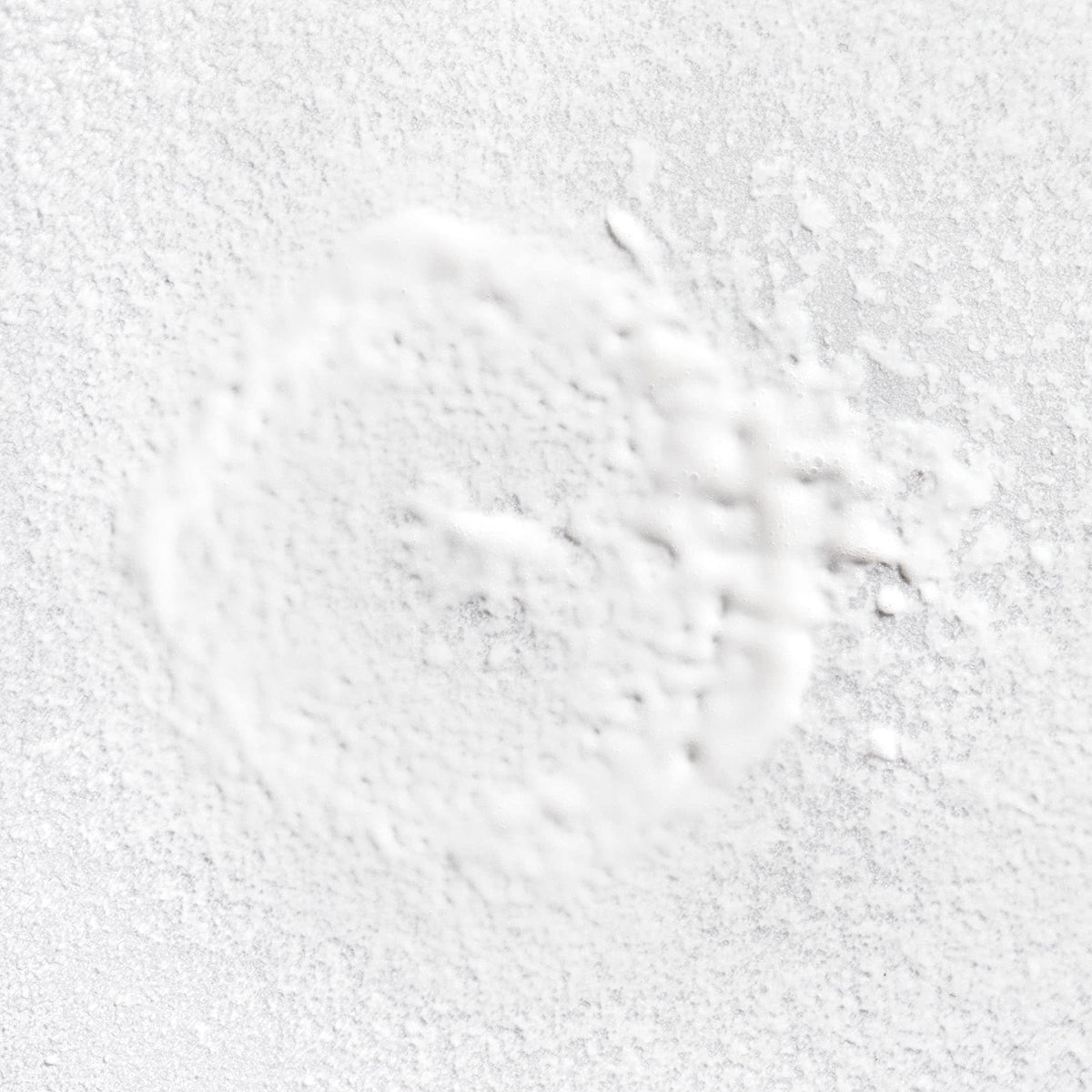 Briogeo Rosarco Milk sprayed from hand for easy detangling benefit