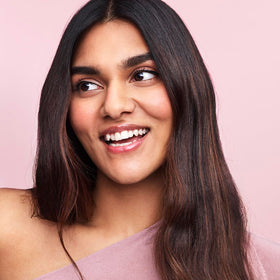 After blowout shot showing Briogeo delivers sleek, shiny, smooth-looking hair