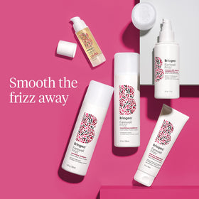 Lifestyle image of spray on curly hair demonstrating smoother definition
