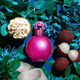 Britney Spears perfume on a dressing table styled to show daily lifestyle fit