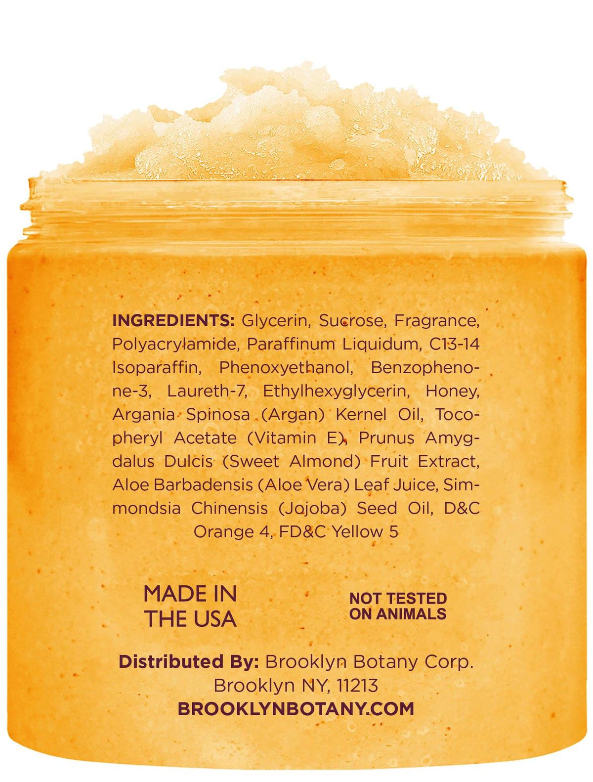 Close-up of scrub texture showing sugar grains and honey, highlights gentle exfoliation