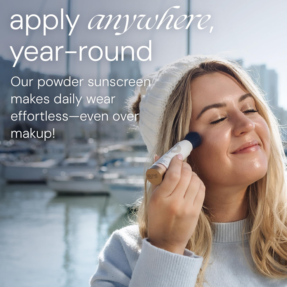 Brush On Block being brushed across cheek for sheer SPF 50 coverage