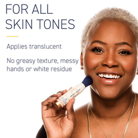 Brush On Block being applied over makeup for quick reapplication benefit