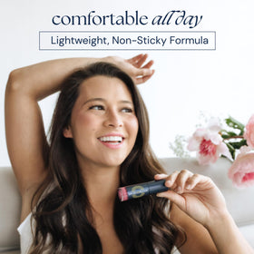 Brush On Block texture on hand illustrating smooth non-sticky gloss and moisturizing finish
