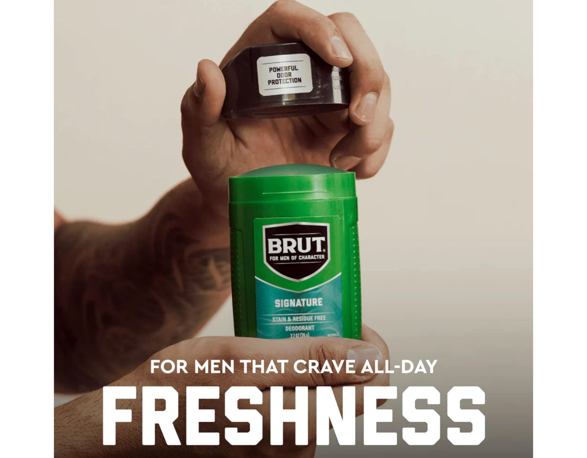 Brut next to ruler showing 2.7 oz size and travel-friendly advantage