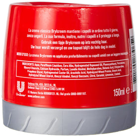 Brylcreem close-up of cream on fingers demonstrating smooth styling control