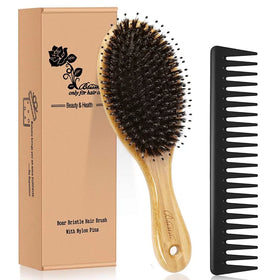 Bsisme bamboo paddle brush front view showing ergonomic handle and bristle pad for comfortable styling