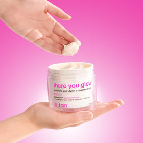 B.TAN bottle beside a hand to show 6.7 fl oz size and scale
