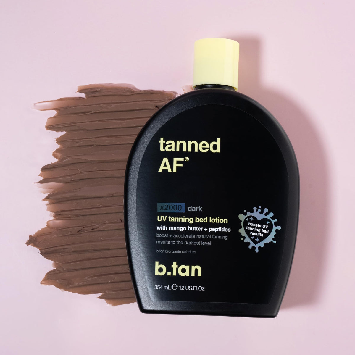 b.tan tinted lotion swipe showing immediate bronzing effect