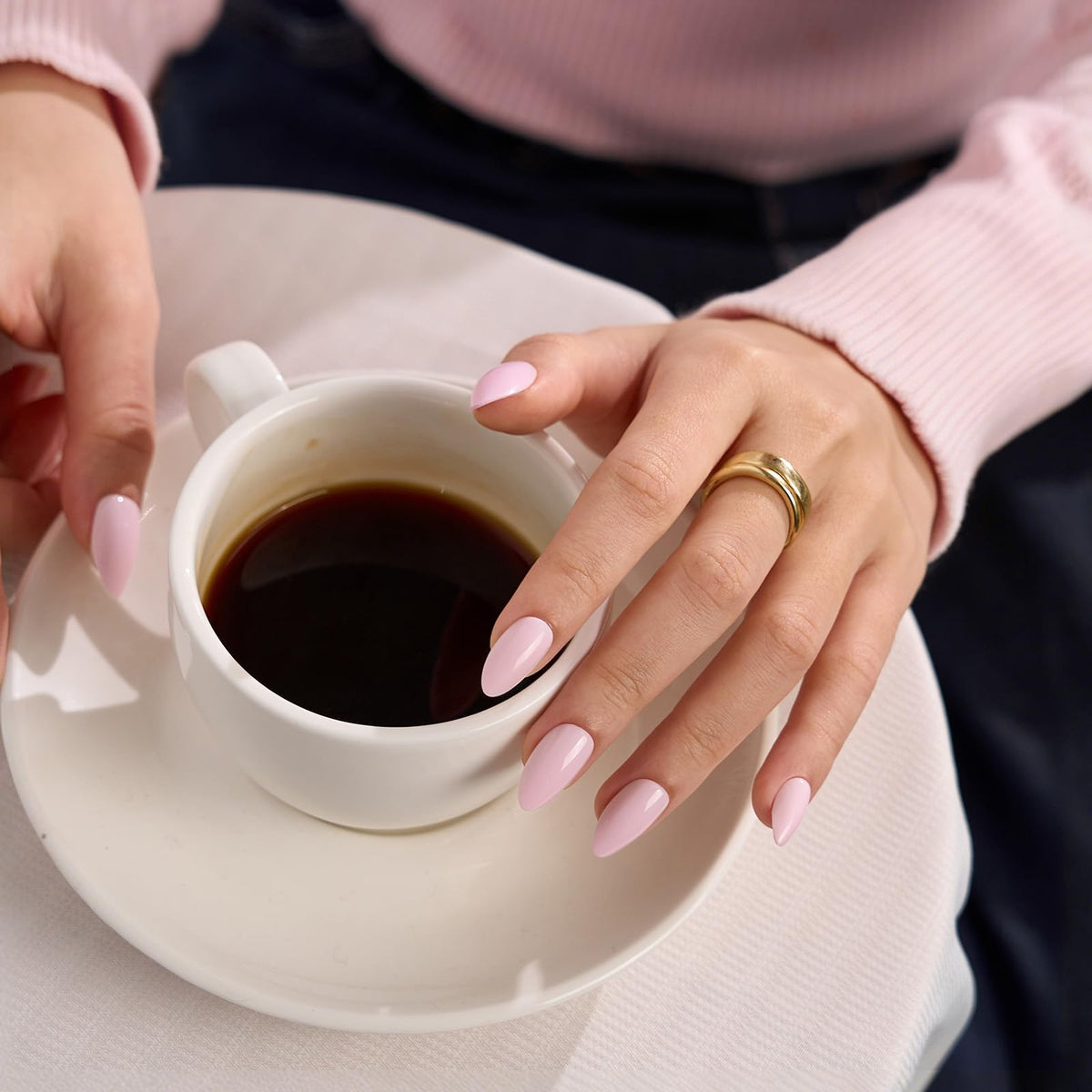 BTArtbox applied on hand displaying short light-pink almond nails that look salon-ready