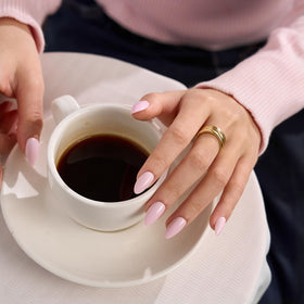 BTArtbox applied on hand displaying short light-pink almond nails that look salon-ready