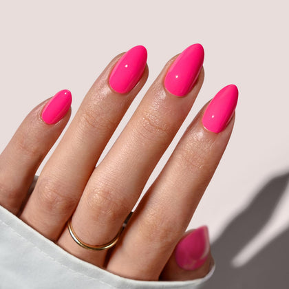 BTArtbox front packaging showing hot pink almond press on nails and contents for quick styling
