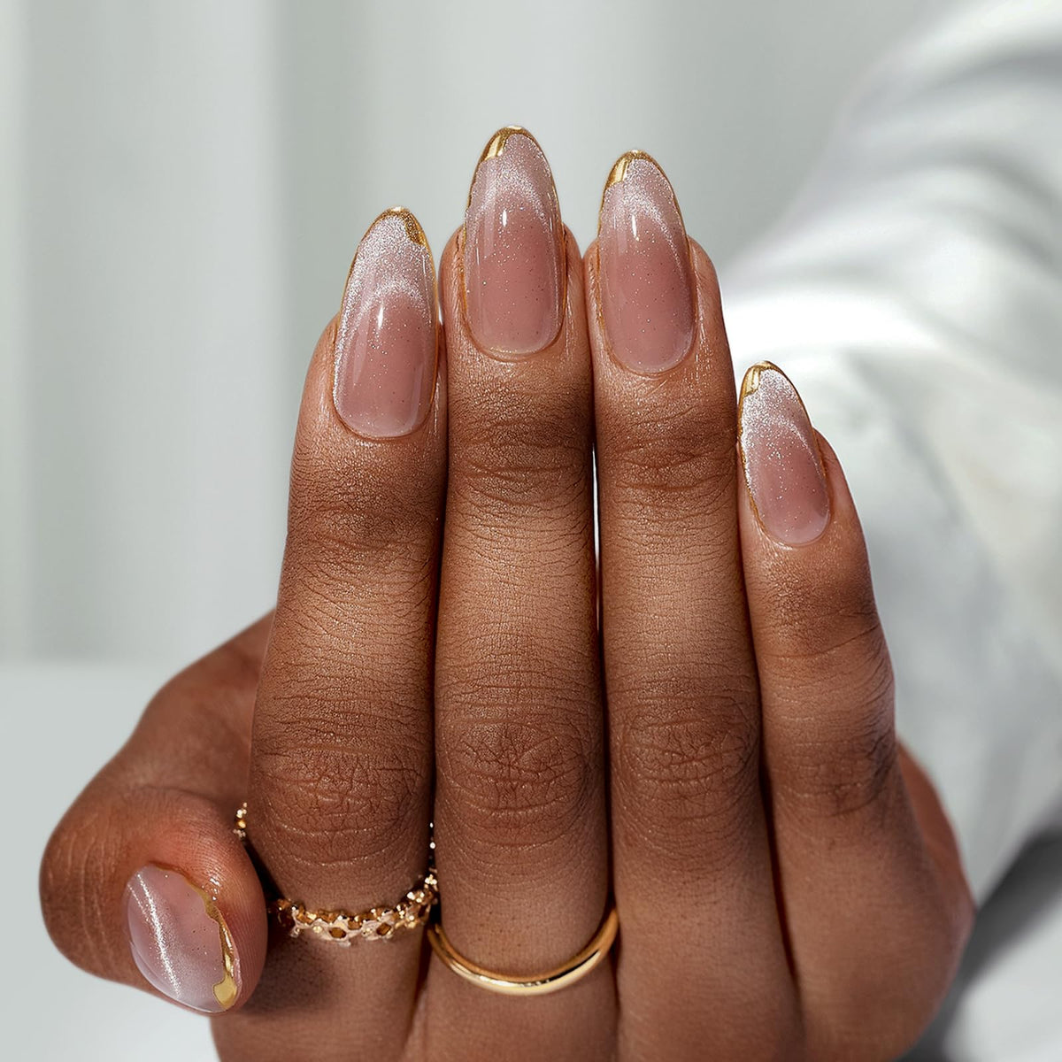 BTArtbox nails in hand for scale showing true-to-size medium length benefit