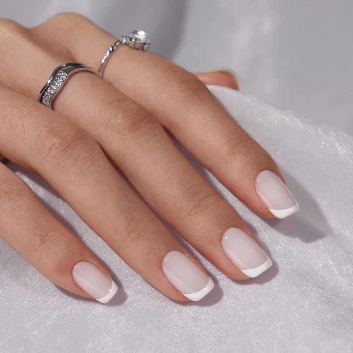 BTArtbox worn on hand in real life, demonstrating natural-looking French style