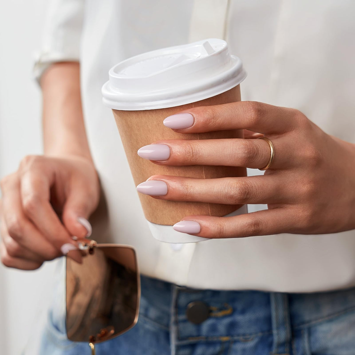 BTArtbox nails applied on hand in everyday setting showing comfortable, salon-style look