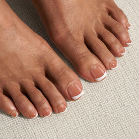 BTArtbox toenails next to ruler showing compact size and accurate fit