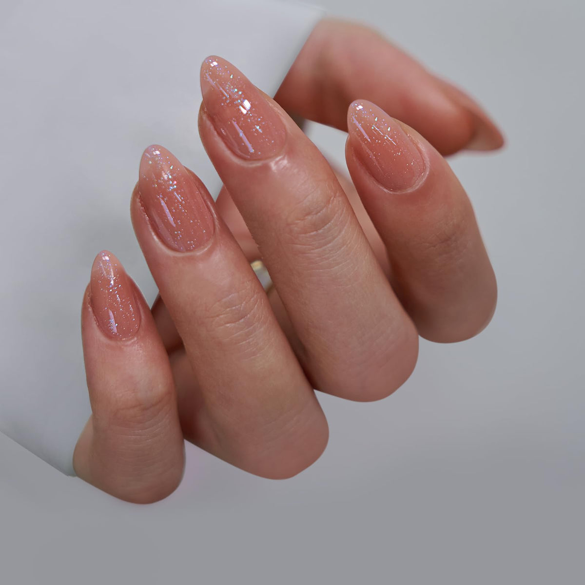 BTArtbox side profile of short almond press on nail showing natural curve and fit