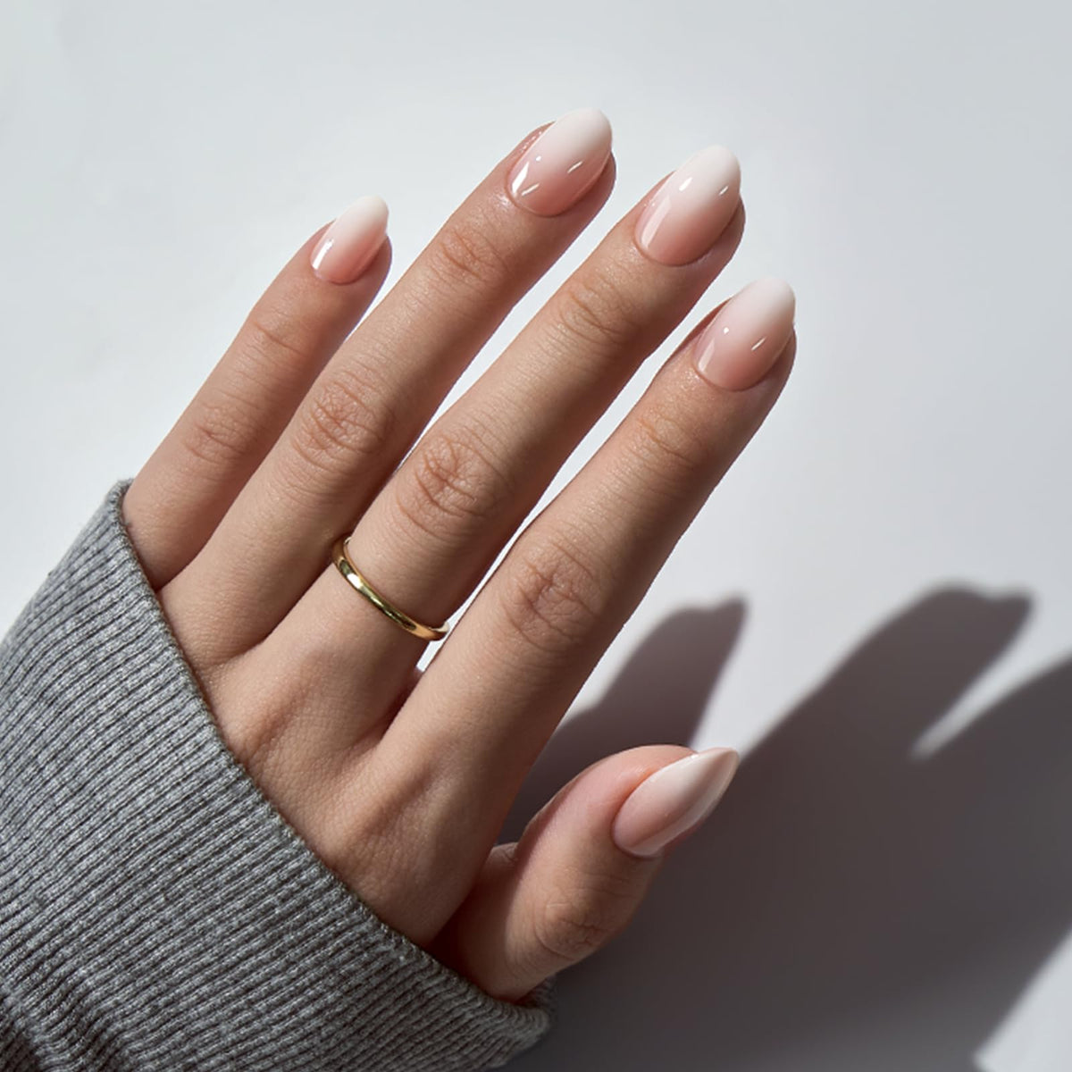BTArtbox close-up of gel-made nude white ombre texture with realistic salon shine