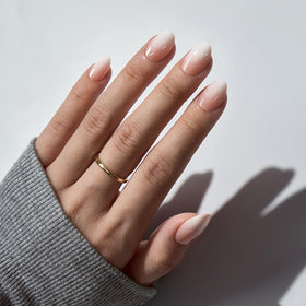 BTArtbox close-up of gel-made nude white ombre texture with realistic salon shine
