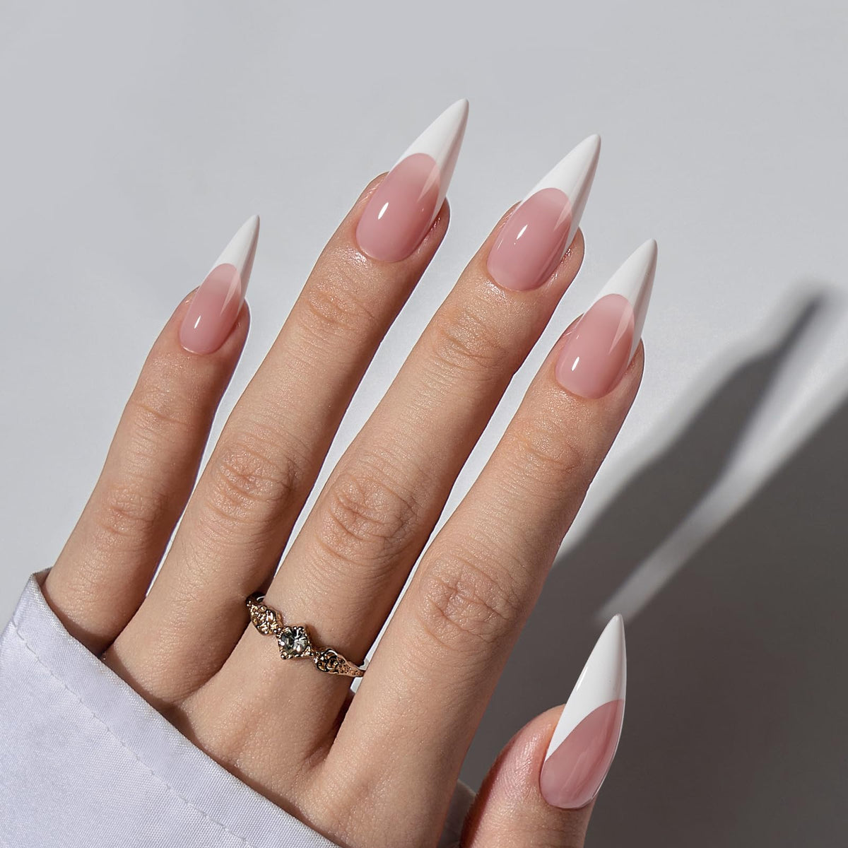 BTArtboxnails long stiletto array displaying pink French tips, benefit: elegant shape