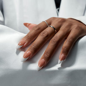 BTArtboxnails medium almond tips displayed in rows showing consistent shape and size