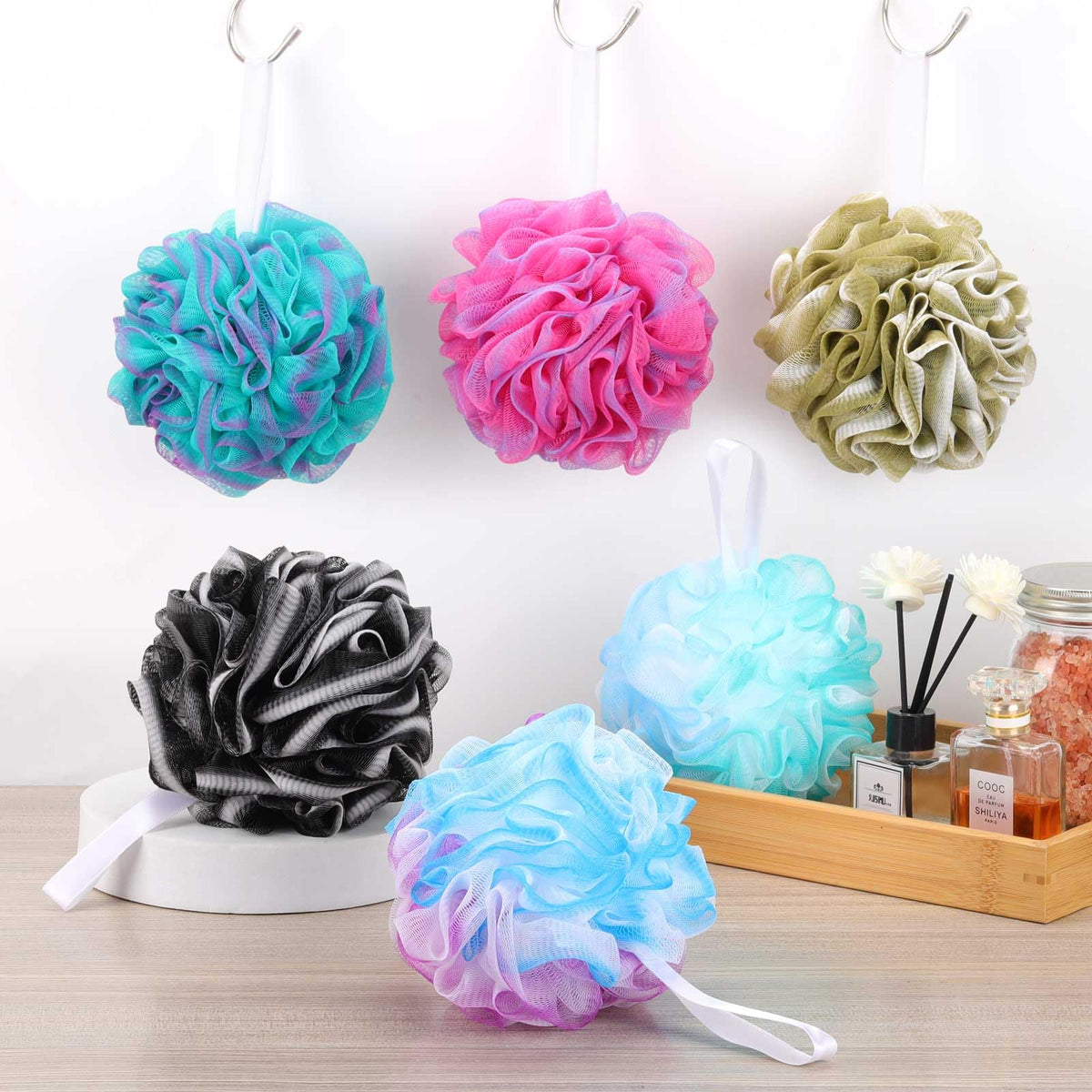 BTYMS loofah styled in bathroom setting to show lifestyle use and neat guest-ready look