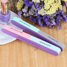 BTYMS block beside fingers showing compact size and easy handling