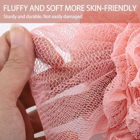 BTYMS single 60g pouf in hand to show comfortable grip and approximate 5.9 inch size