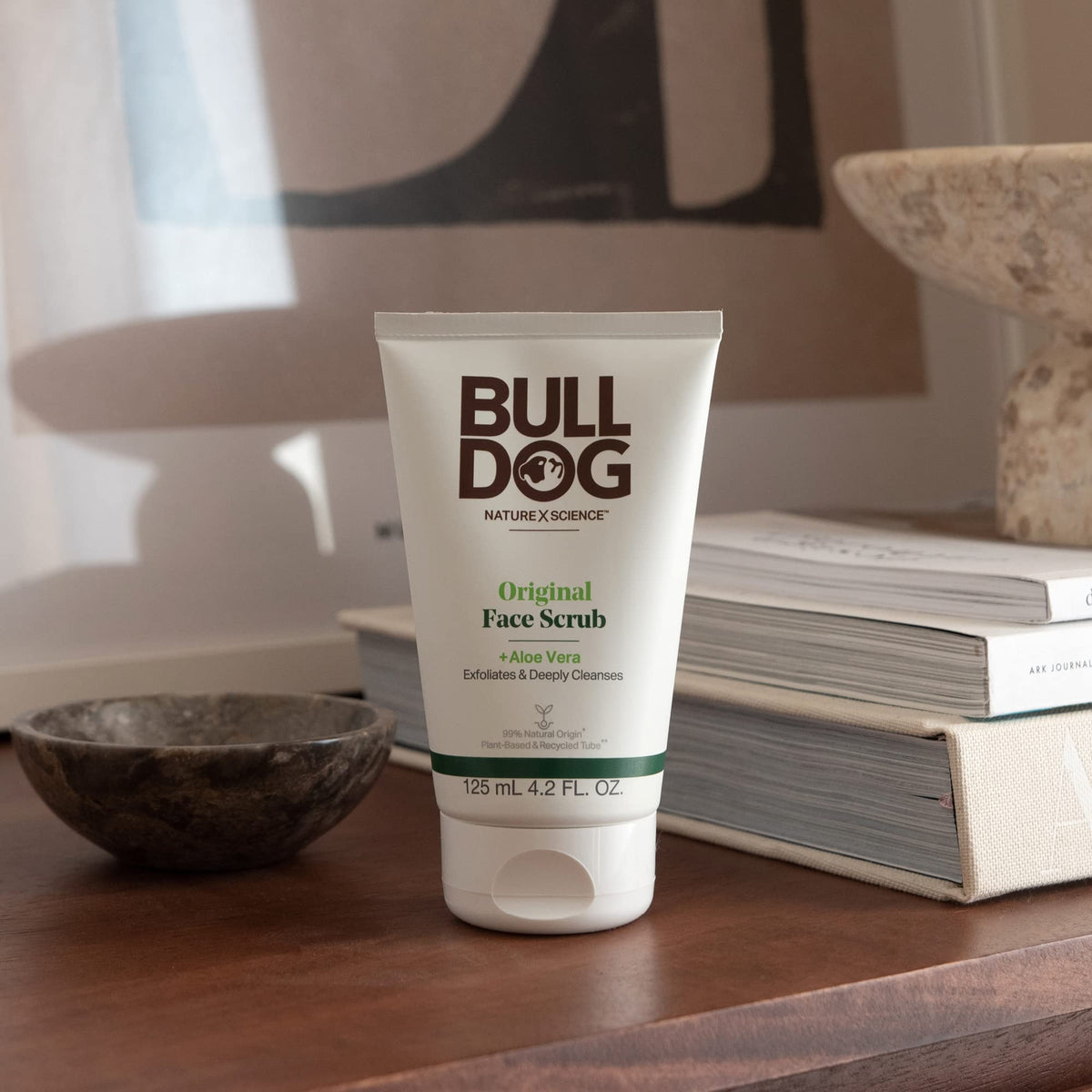 Bulldog original moisturizer tub open with cream emphasizing lightweight hydration