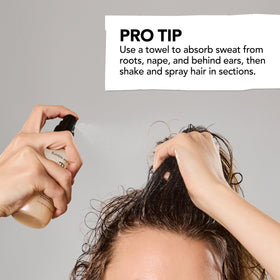 bumble and bumble being sprayed on scalp after workout to remove sweat odor