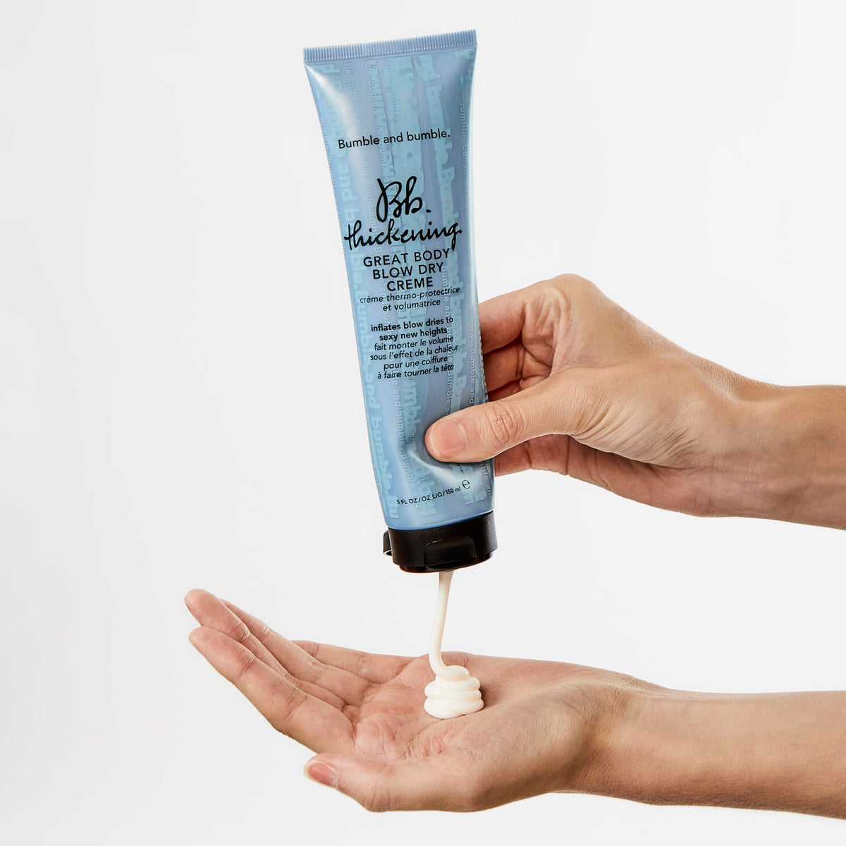 Bumble and bumble being used with round brush to build salon-style volume