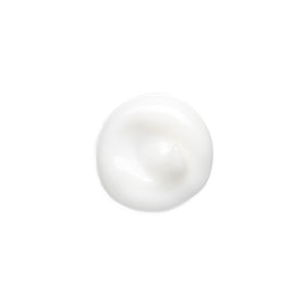 Bumble and bumble cream being applied to hair demonstrating smooth, frizz-control benefit
