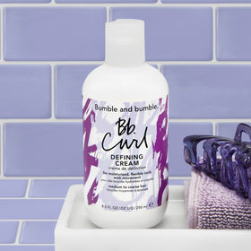 Bumble and bumble close-up label showing UV filters and product benefits
