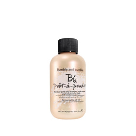 Bumble and bumble. front packaging showing the Pret-à-powder jar and benefits