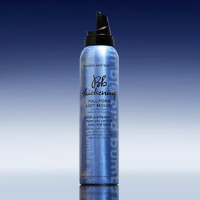 Bumble and bumble before-and-after blow-dry showing lifted volume and soft hold benefit