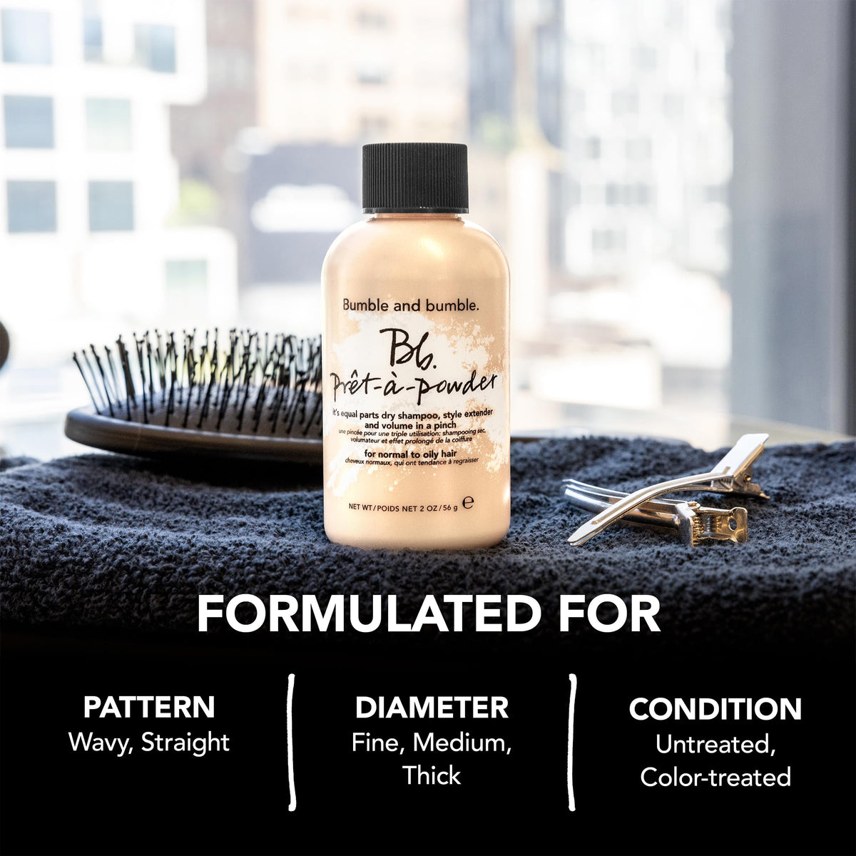 Bumble and bumble hand applying powder to roots for instant volume