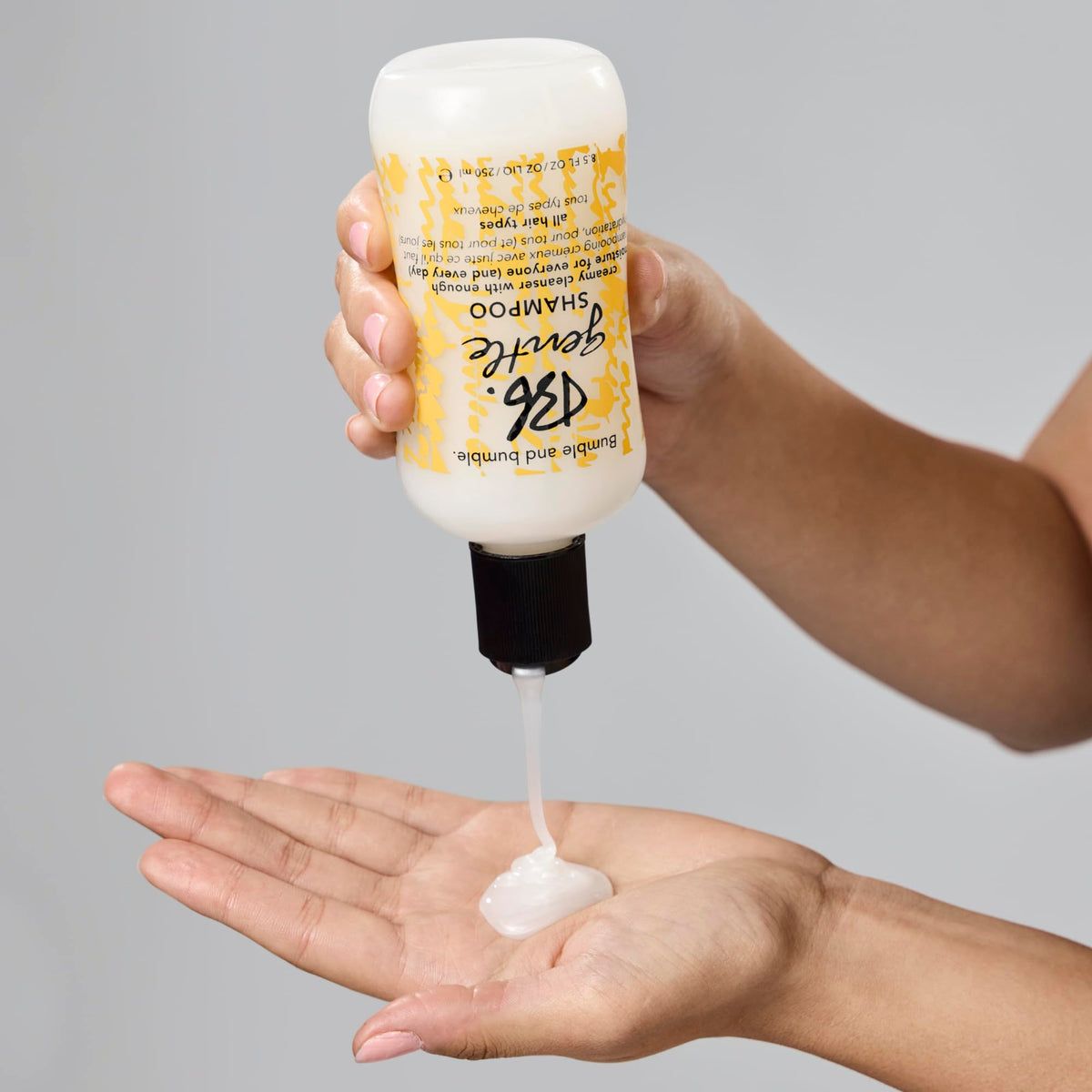 Bumble and bumble shampoo beside conditioner illustrating paired moisture routine