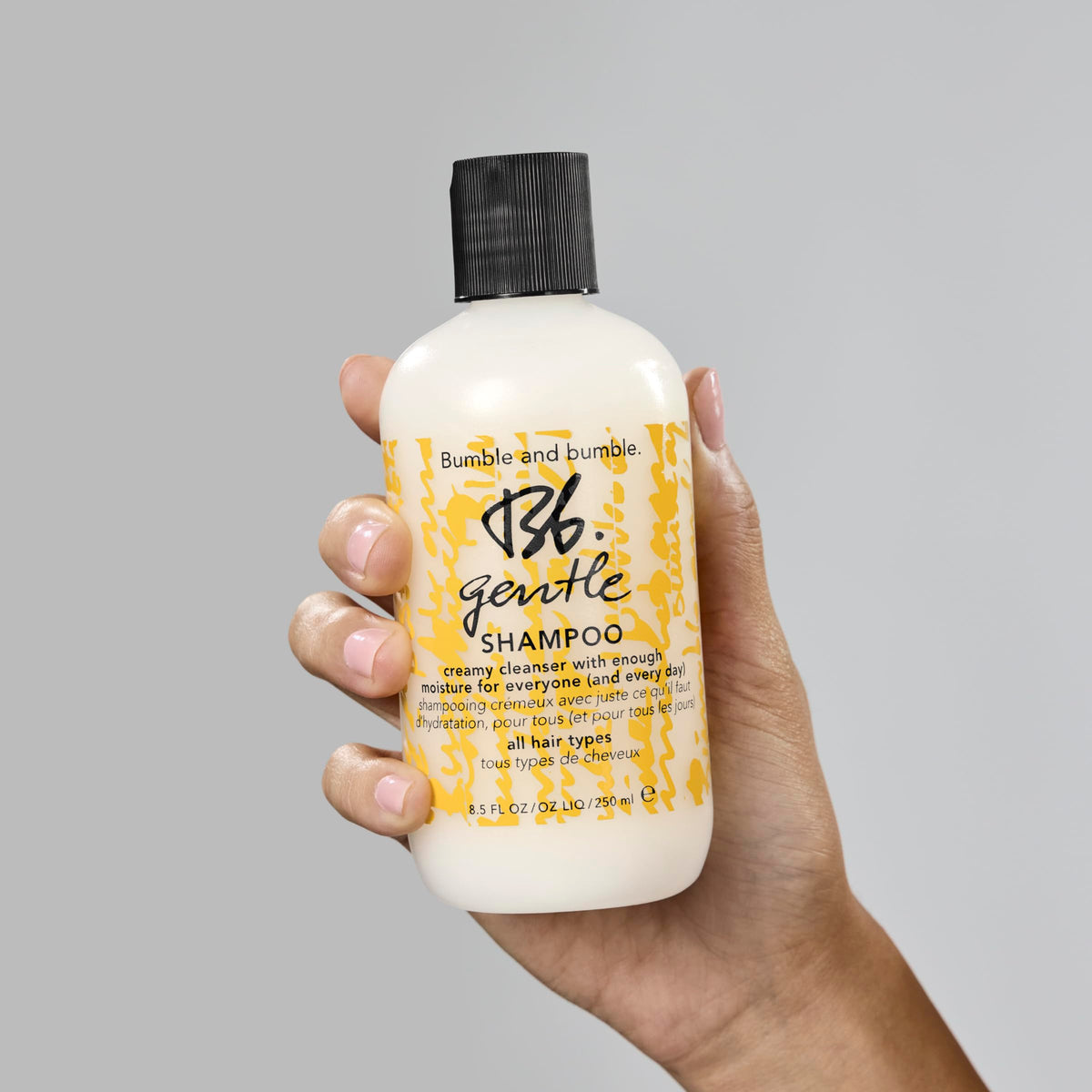 Bumble and bumble shampoo on shower shelf in lifestyle scene for everyday care