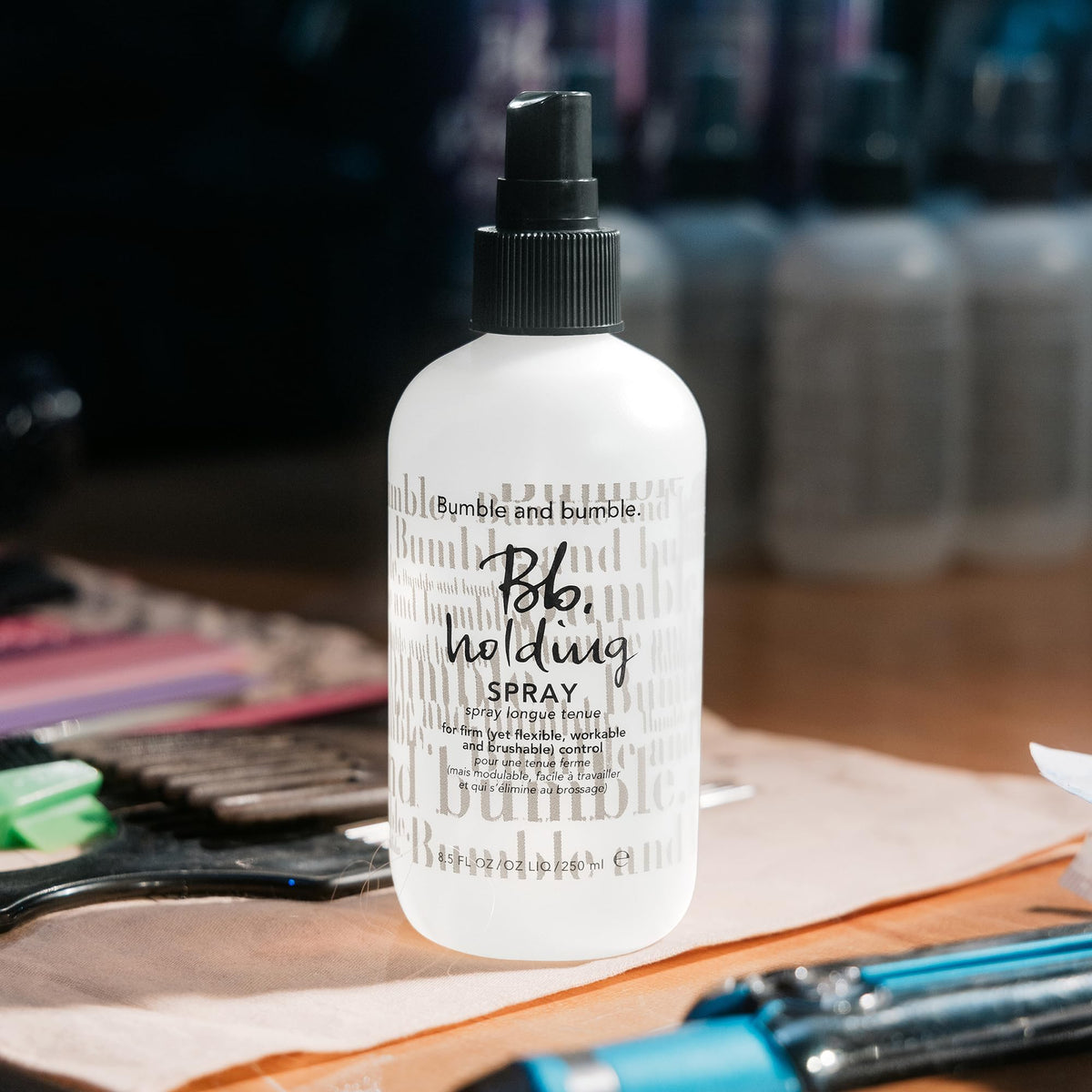 Bumble and bumble size and scale comparison showing 8.5 fl oz portability