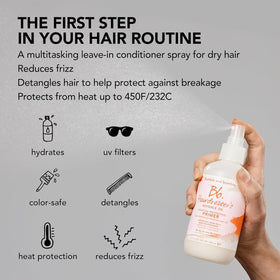Bumble and bumble held in hand for scale showing 11.8 fl oz travel-friendly benefit