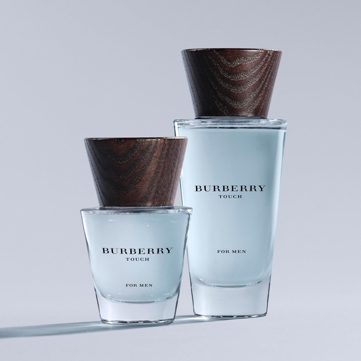 Close-up of fragrance notes and label highlighting cedar and vetiver benefit: shows scent character