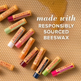 Burt's Bees being applied to lips showing immediate conditioning benefit