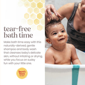Burt's Bees bottle in parent's hand washing baby's hair safely