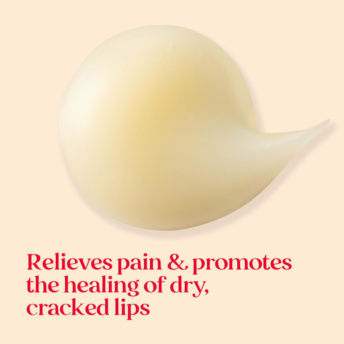 Burt's Bees balm spread on fingertip, hydrating oils visibly nourishing lips