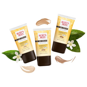 Burt's Bees applying BB Cream on hand to demonstrate blendability and coverage benefit