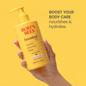 Burt's Bees 13 oz bottle next to a ruler showing size and value for daily use