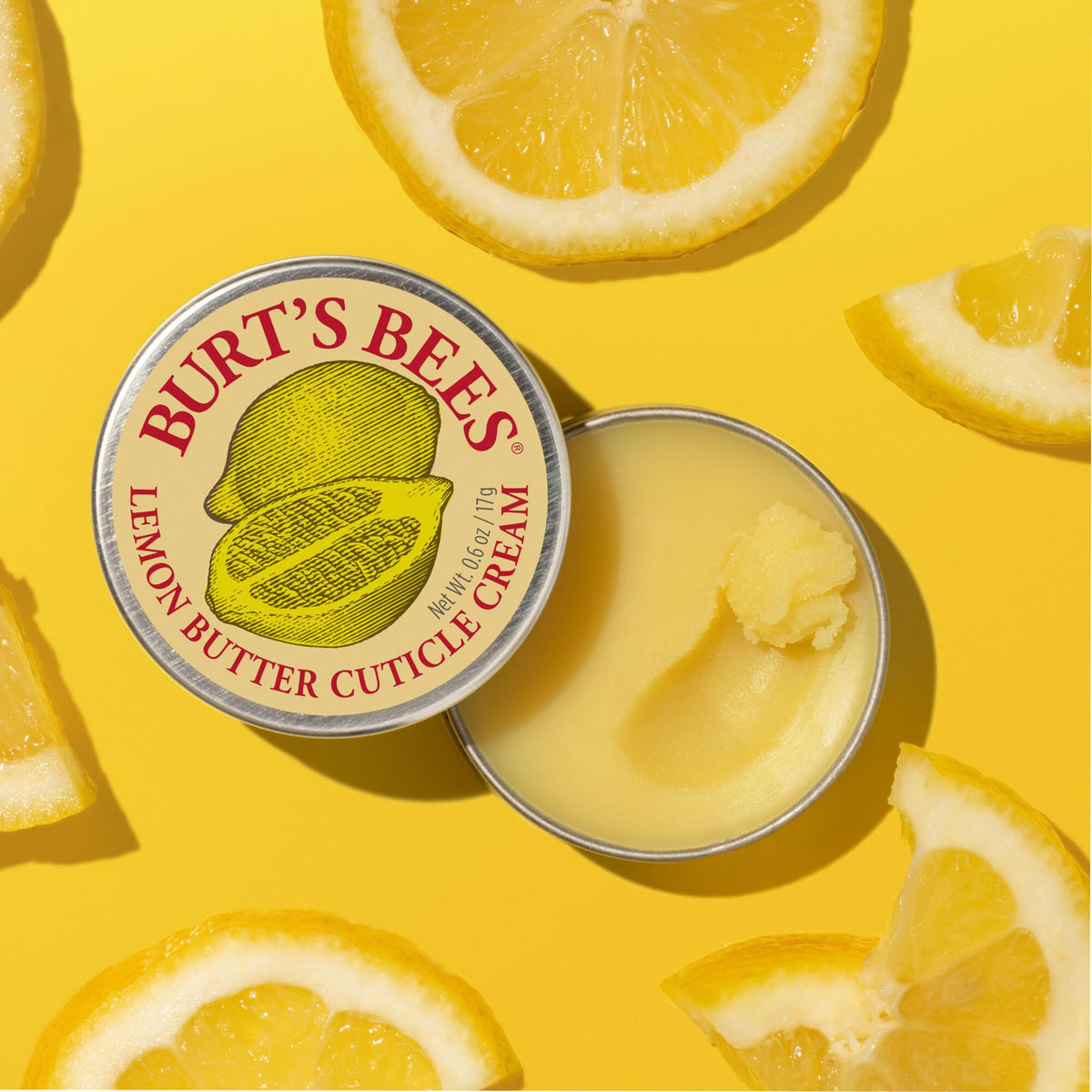 Burt's Bees being massaged into a cuticle to soften and repair