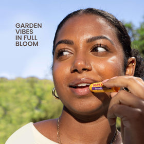 Burt's Bees arranged flavors top-down showing variety and natural scents