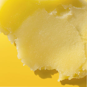 Close-up ingredients cocoa butter and almond oil highlighting natural nourishment