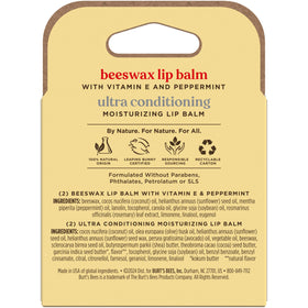 Person applying Burt's Bees lip balm outdoors conveying protection and comfort